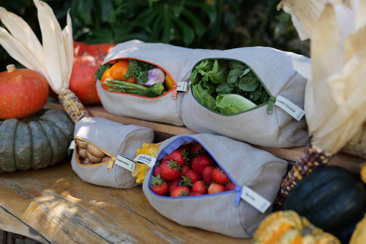 Ambrosia linen produce bags set up in a fall fridge